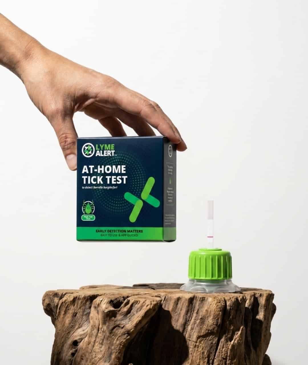 Clarity, Control, and Confidence Hand holding a blood sample in a test tube for Lyme disease testing.